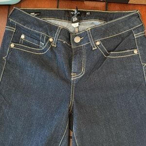 New, never worn Torrid 10R dark blue skinny jeans.